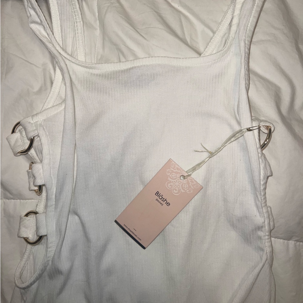 Honeybum NWT white jersey body suit with gold metal accents on sides